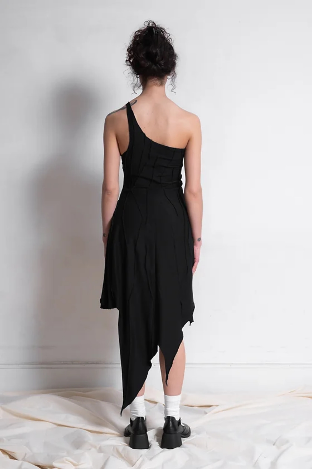 Black asymmetric gusset dress