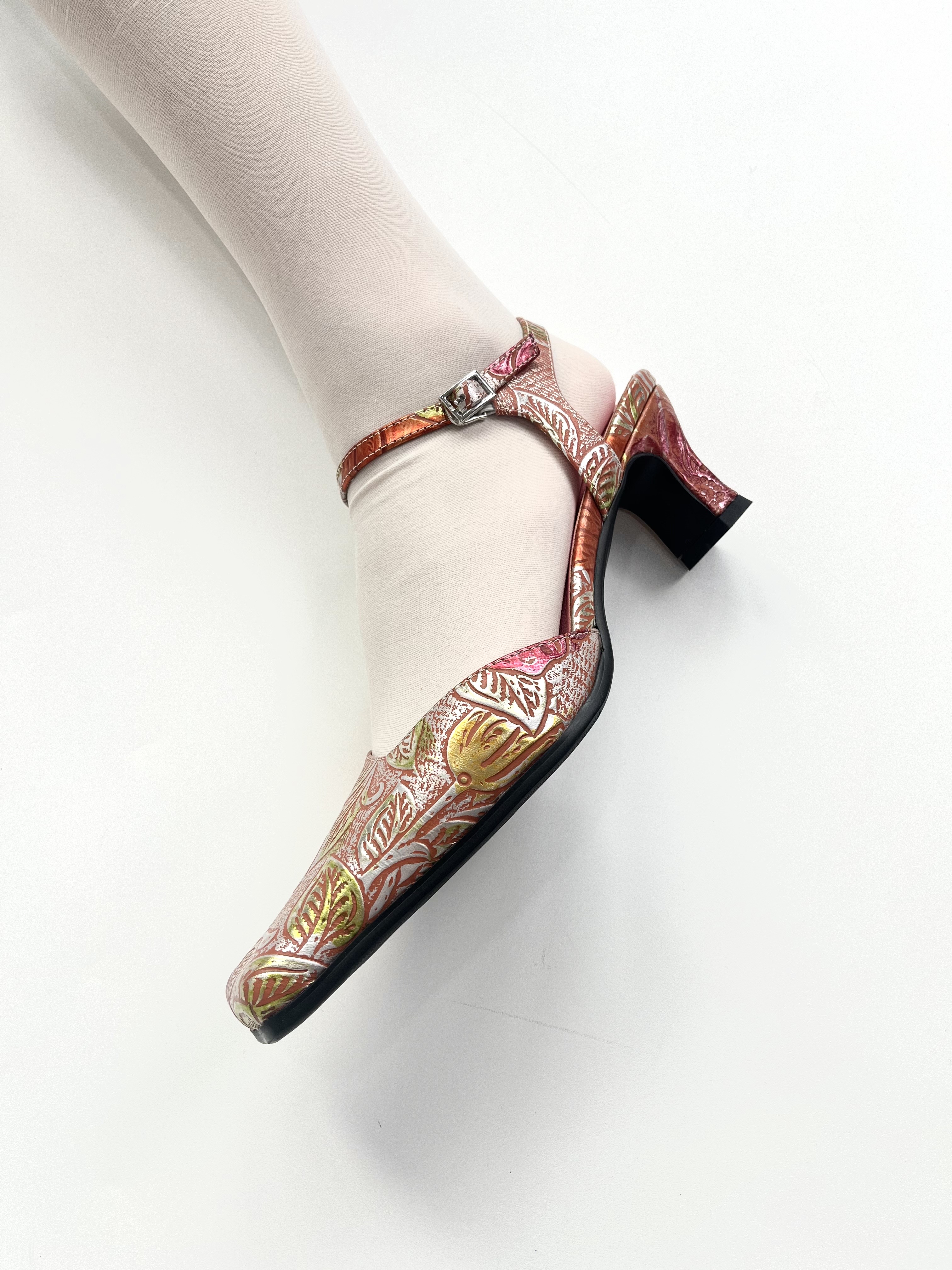 Disco crafted cowhide floral heels